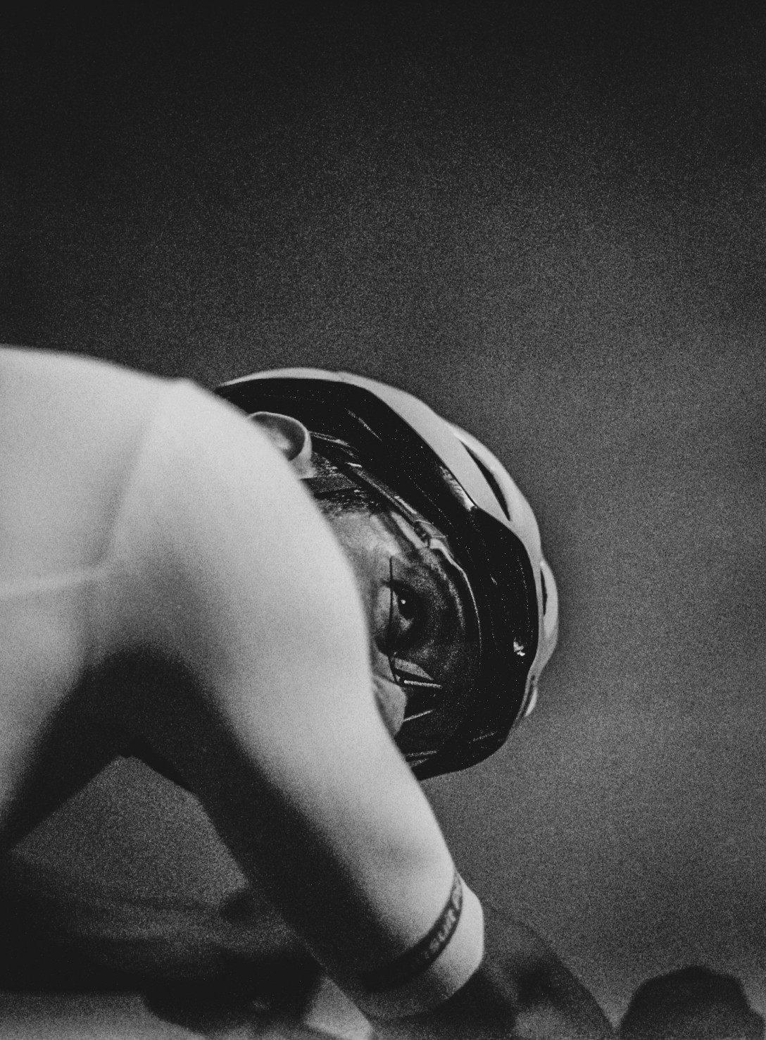 Black and white study of a bent figure