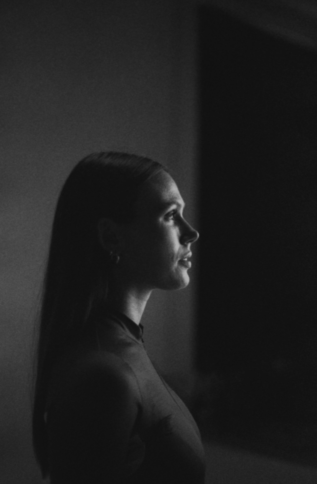 Black and white profile portrait of a woman