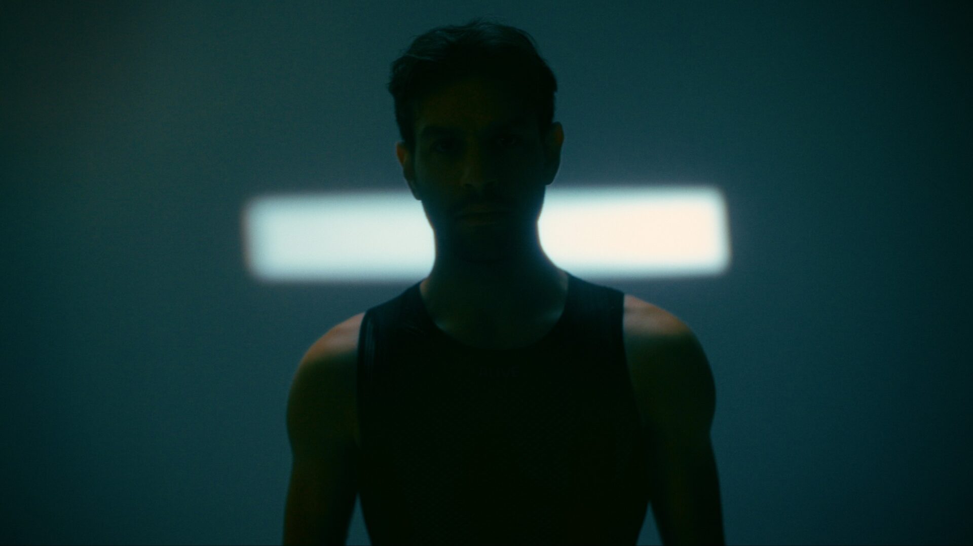 Portrait of a man in blue light